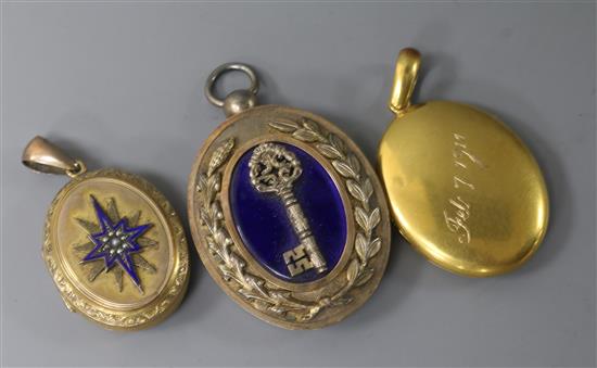 An early 20th century yellow metal oval locket and two other lockets including silver gilt and enamel,